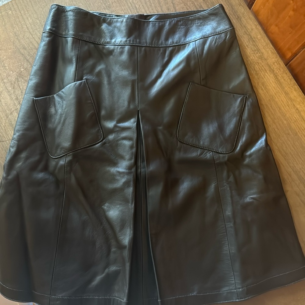Etcetera black leather skirt. 100%. New without tags. Size 2